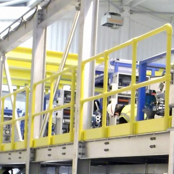 Factory guard tubular railing system for mezzanine level