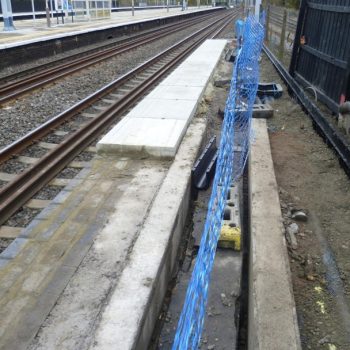 Mid Installation of anti slip paving Railway Platform