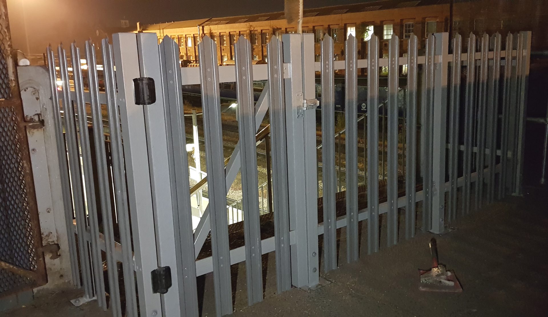 GRP Palisade security fence gate fitted on night shift