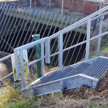 EA drainage ditch level monitoring GRP access steps with guardrail